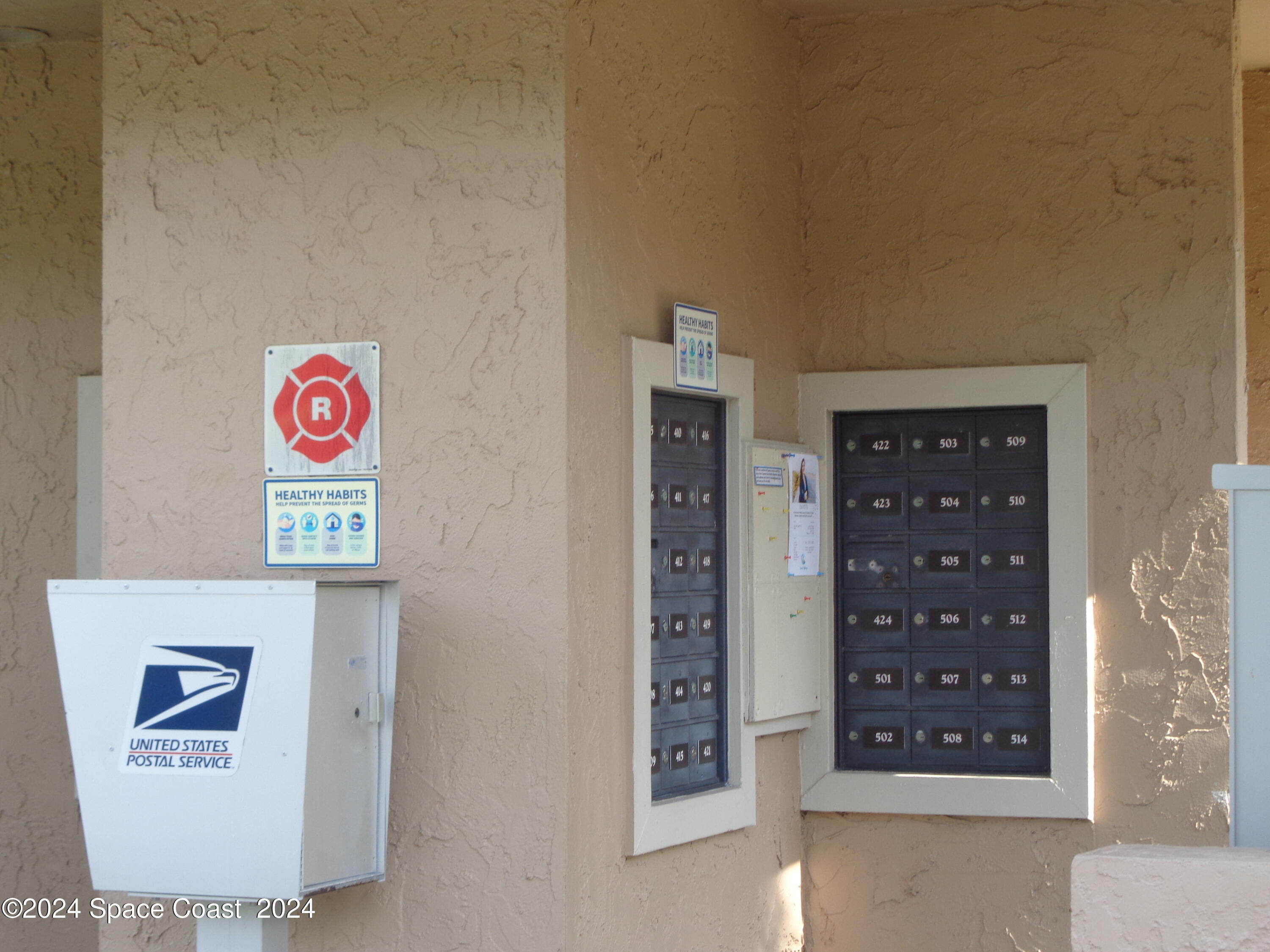 7667 North Wickham Road, Unit 710 Melbourne, FL 32940 - Photo 20 of 23 a view of an entryway with wall paintings