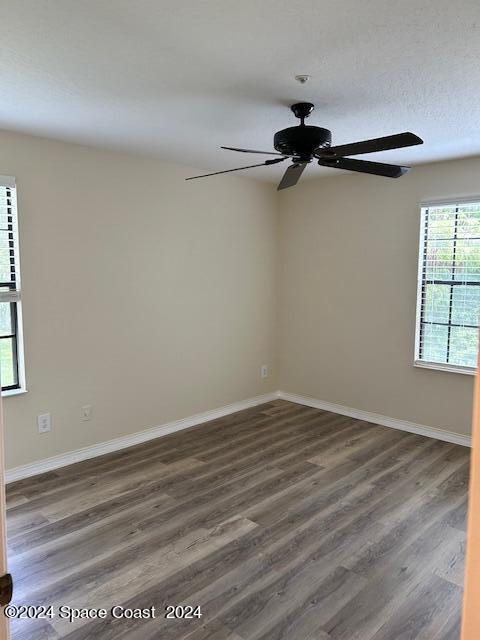7667 North Wickham Road, Unit 710 Melbourne, FL 32940 - Photo 10 of 23 wooden floor in an empty room