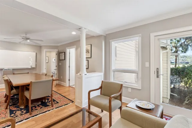 a view of a dining room with furniture window and outside view