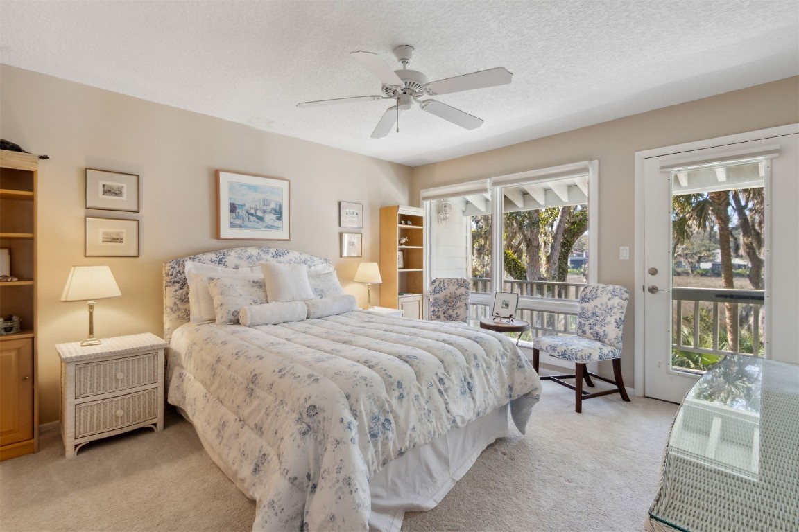 3417 Sea Marsh Road, Unit 3417 Fernandina Beach, FL 32034 - Photo 14 of 19 a bed room with a bed and a couch