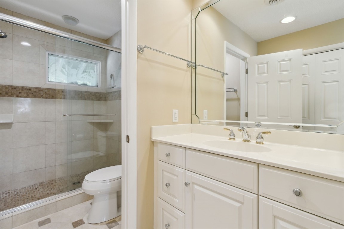 3417 Sea Marsh Road, Unit 3417 Fernandina Beach, FL 32034 - Photo 15 of 19 a bathroom with a sink a toilet and shower
