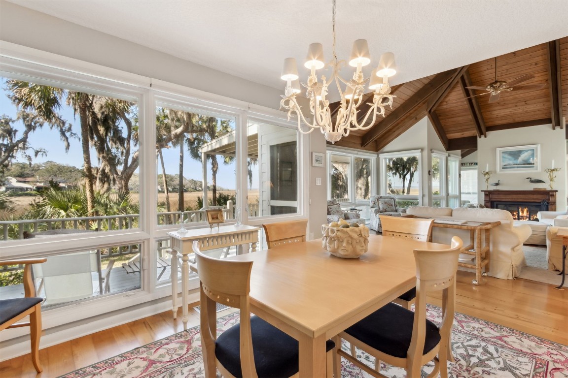3417 Sea Marsh Road, Unit 3417 Fernandina Beach, FL 32034 - Photo 2 of 19 a dining table with chairs and chandelier