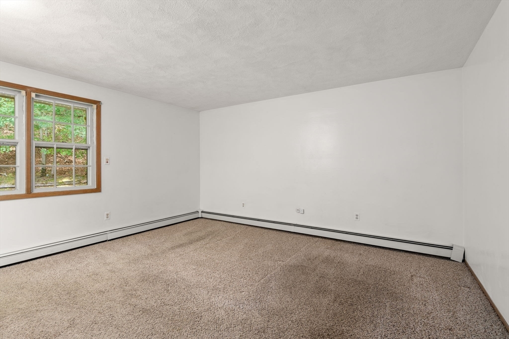 16 Larnis Road Framingham, MA 01701 - Photo 13 of 17 an empty room with a window