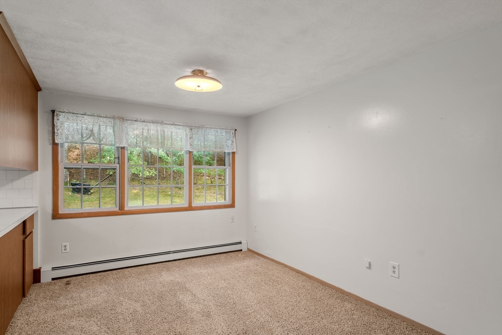 16 Larnis Road Framingham, MA 01701 - Photo 6 of 17 an empty room with a window