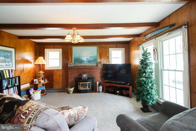 a kitchen with a sink a stove and cabinets