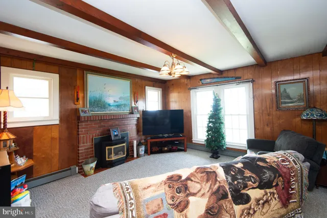 a view of a livingroom with furniture and front door