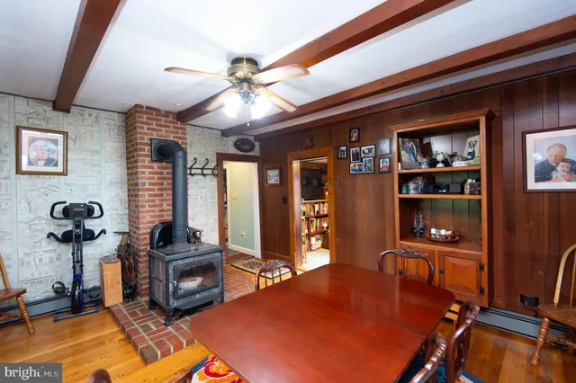 a bedroom with a bed and a table in it