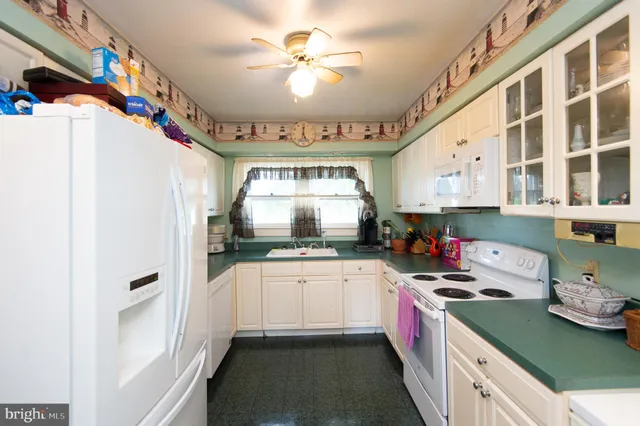 a bedroom with bed and a window