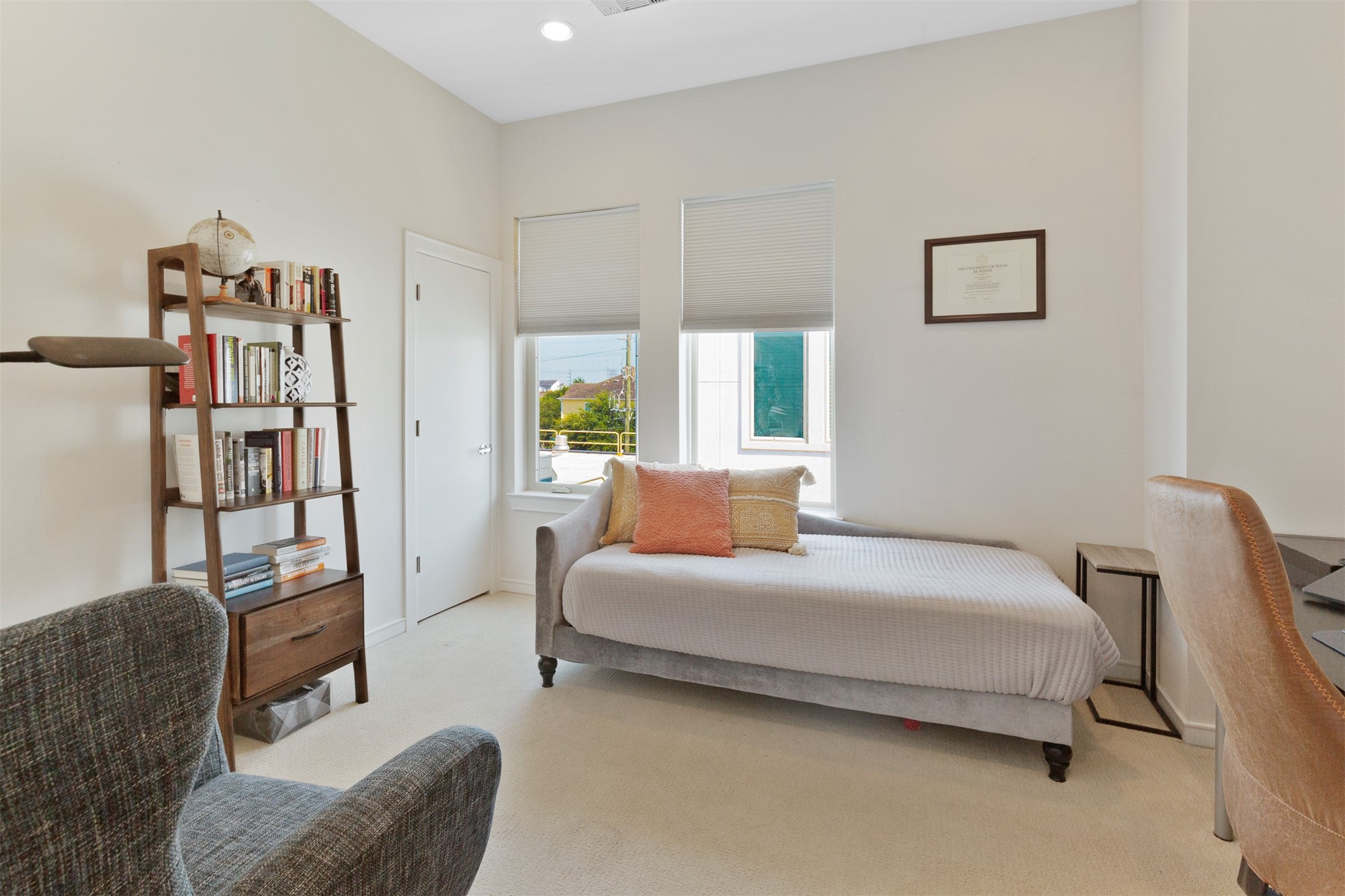 1308 Delano Street Houston, TX 77003 - Photo 12 of 24 a bedroom with a bed and wooden floor