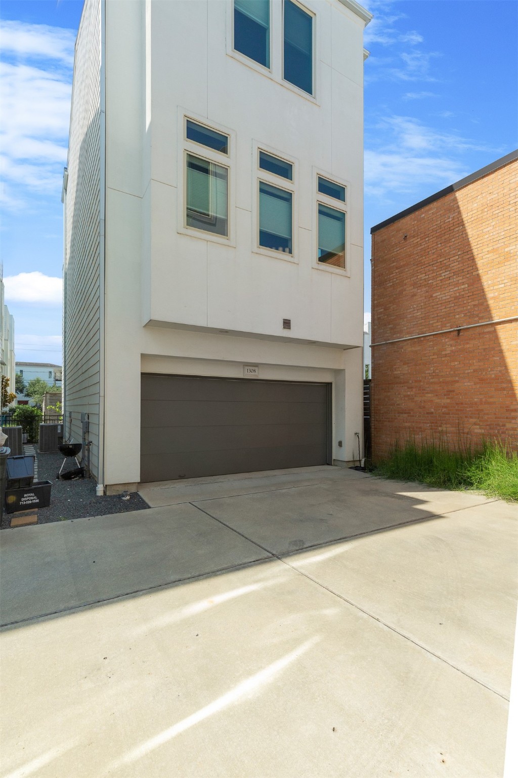 1308 Delano Street Houston, TX 77003 - Photo 18 of 24 a front view of a house with garage