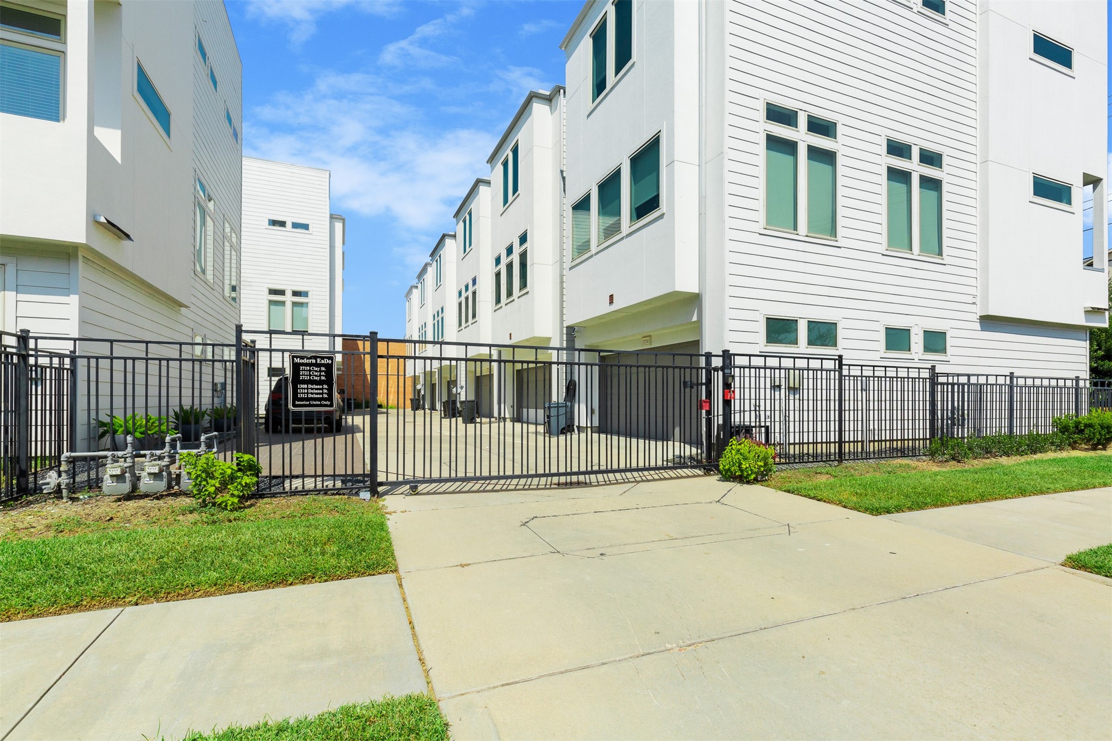 1308 Delano Street Houston, TX 77003 - Photo 21 of 24 a view of a house with a small yard and plants
