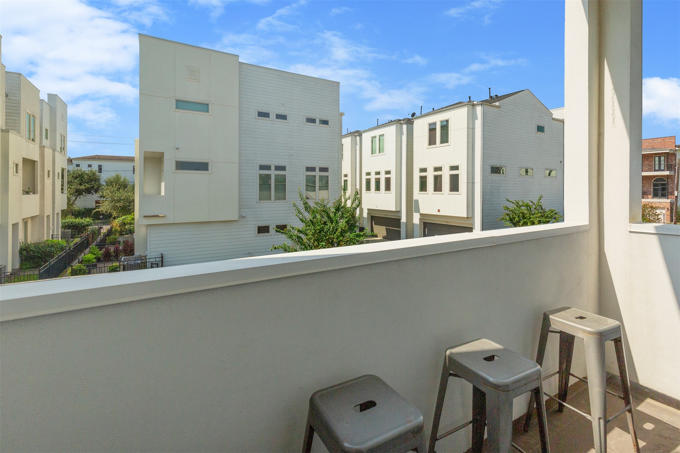 1308 Delano Street Houston, TX 77003 - Photo 7 of 24 a view of a balcony with chairs
