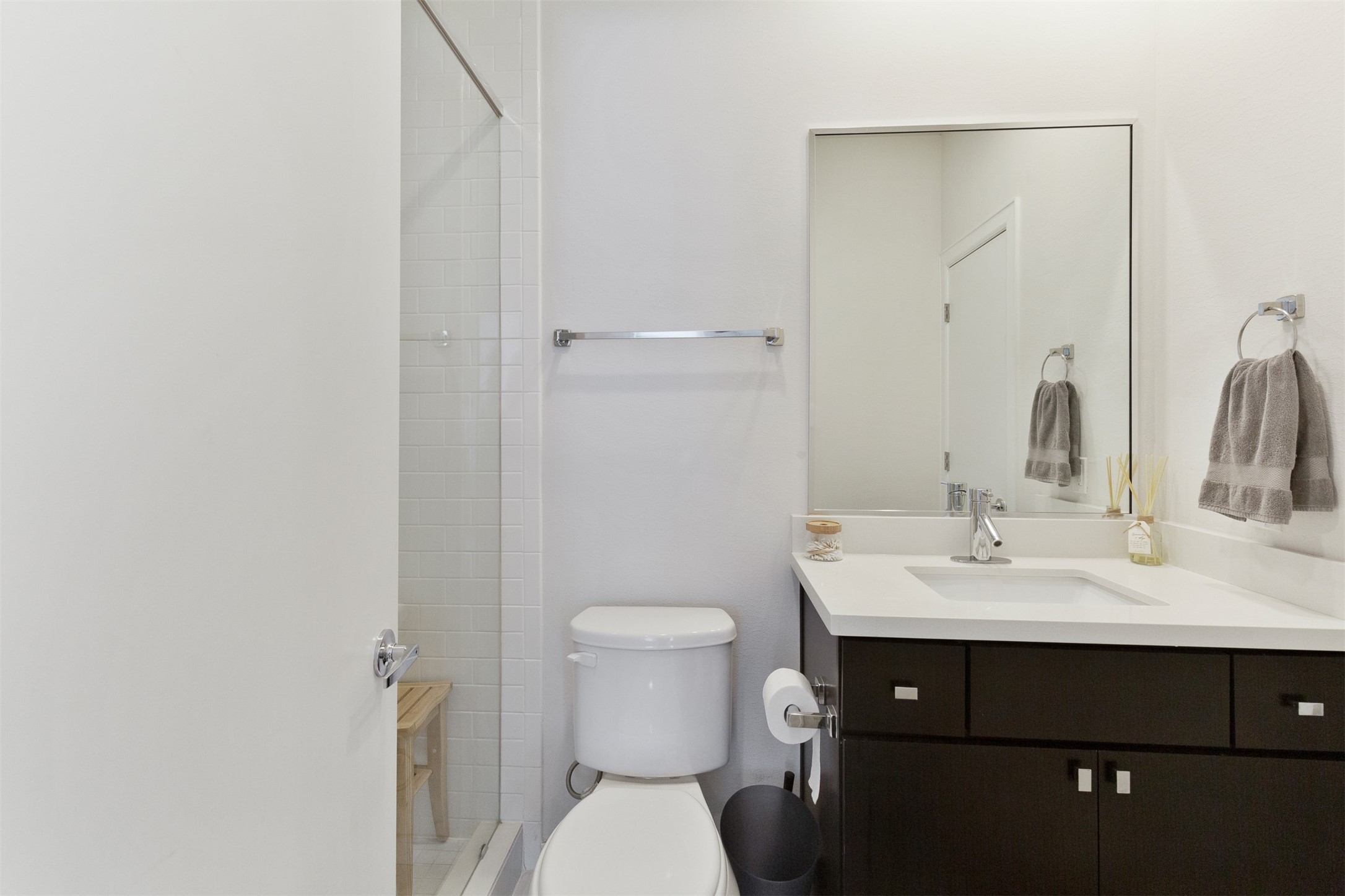 1308 Delano Street Houston, TX 77003 - Photo 10 of 24 a bathroom with a sink toilet and mirror