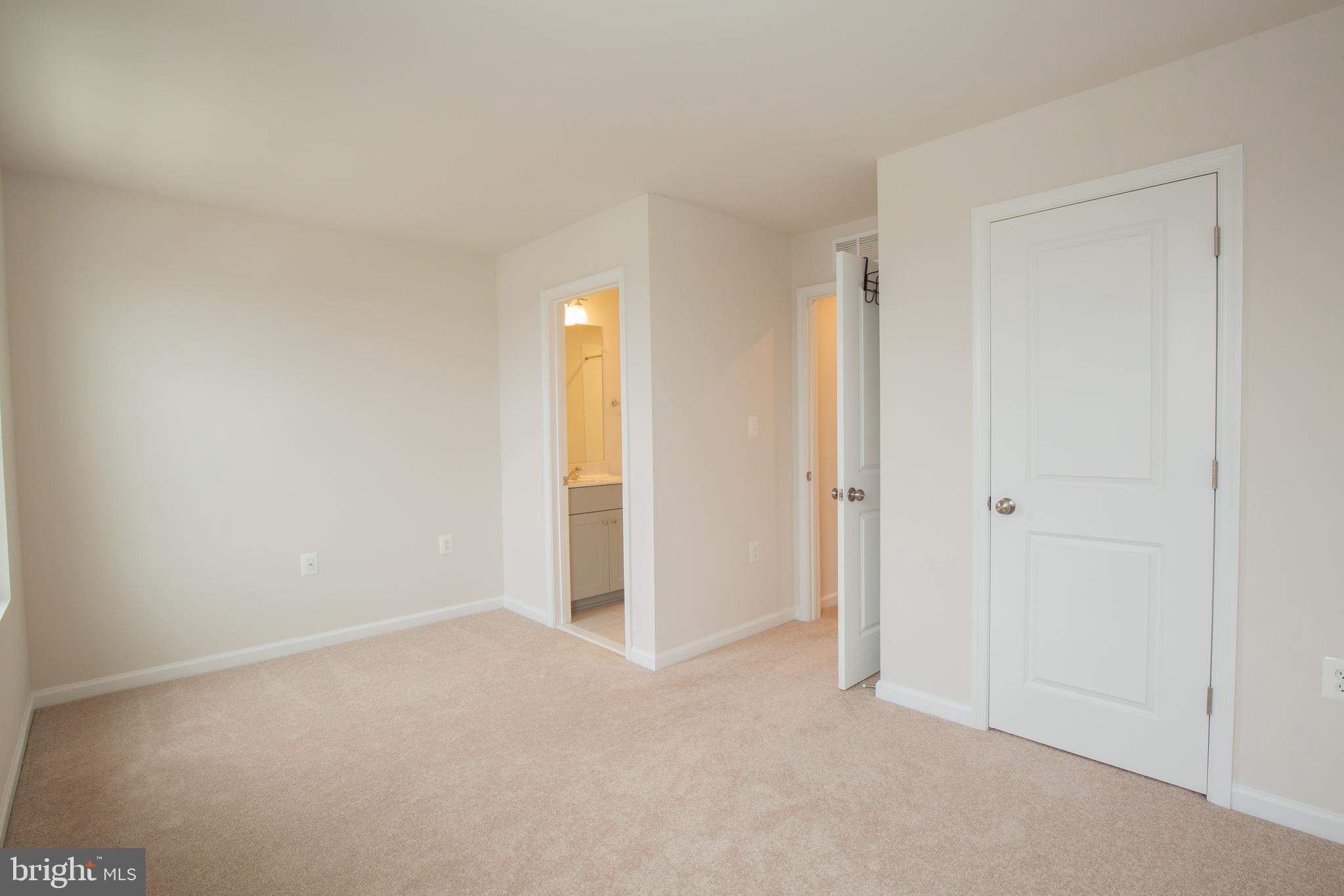 80 Anthem Street Ranson, WV 25438 - Photo 22 of 30 a view of an empty room and a window