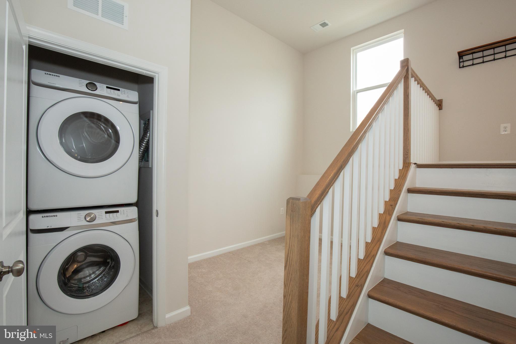 80 Anthem Street Ranson, WV 25438 - Photo 25 of 30 a view of a hallway with washer and dryer