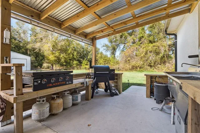 a view of a chairs and table in a room