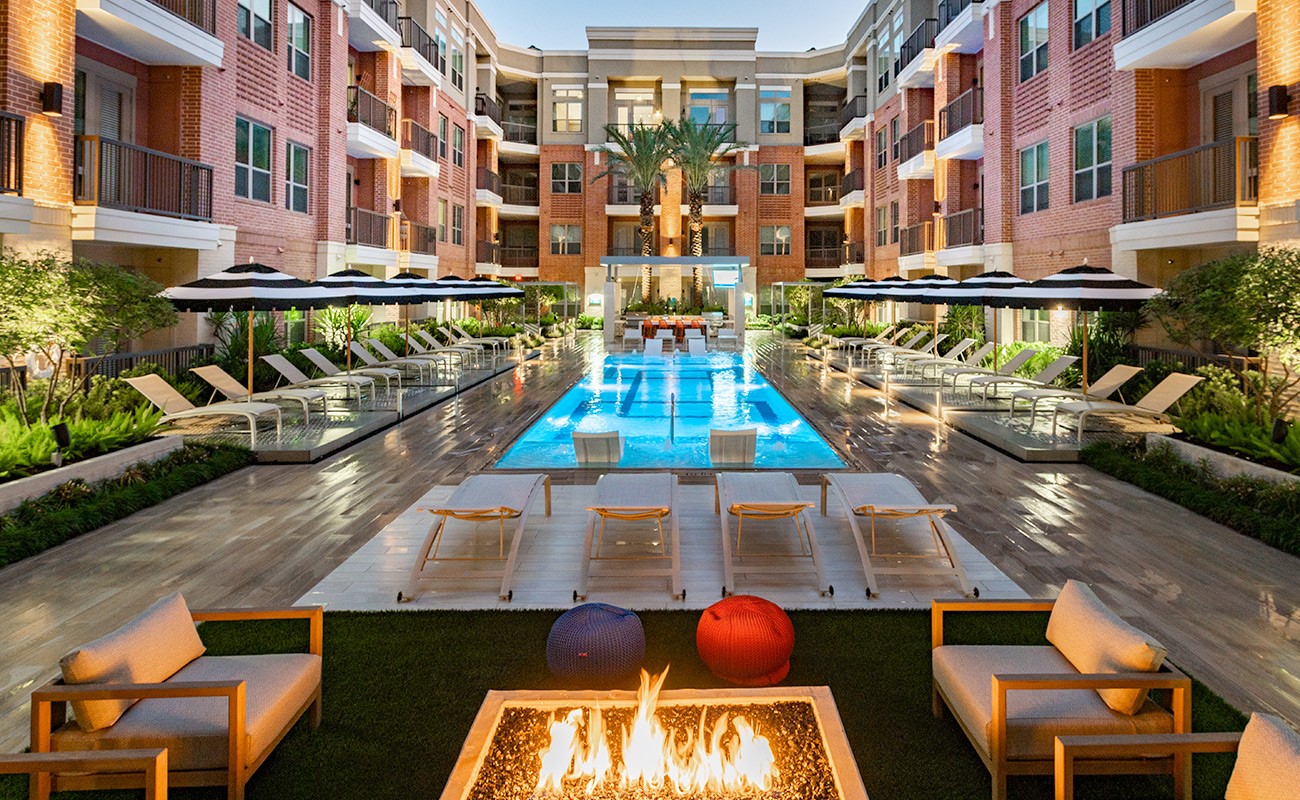 180 Malone Street, Unit 2108 Houston, TX 77007 - Photo 10 of 34 One of two saltwater pools with outdoor kitchen, fire pit and lots of seating.