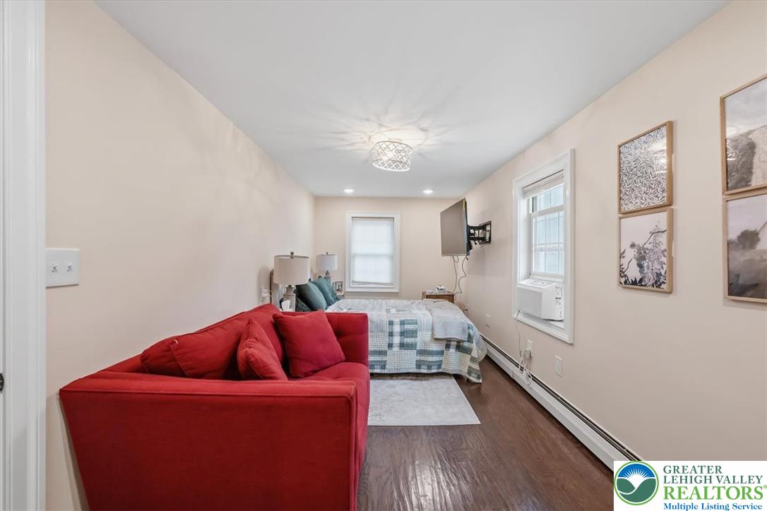 3771 State Road Coopersburg, PA 18036 - Photo 24 of 37 Gleaming hardwood floors and classic window frames define this versatile second-floor bedroom.