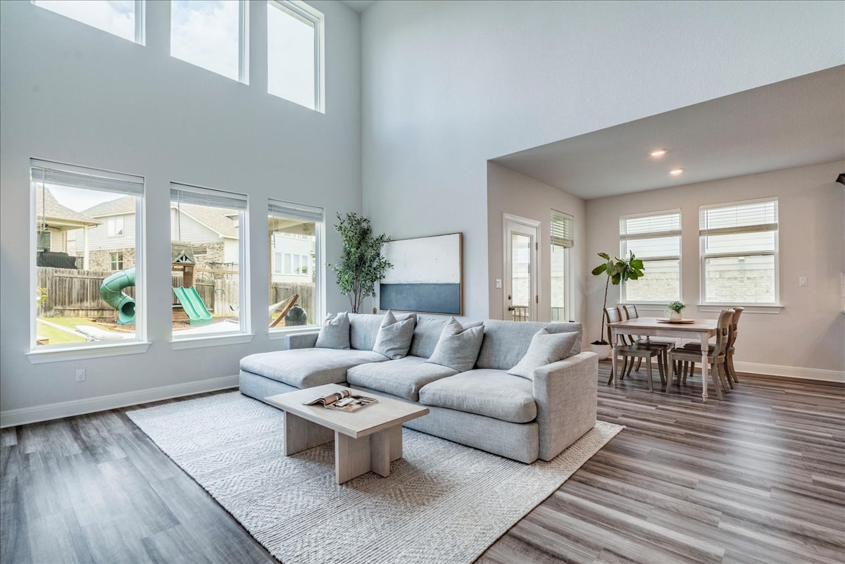 212 Sierra Blanca Road Dripping Springs, TX 78620 - Photo 2 of 37 Living room with tall ceilings and built ins.