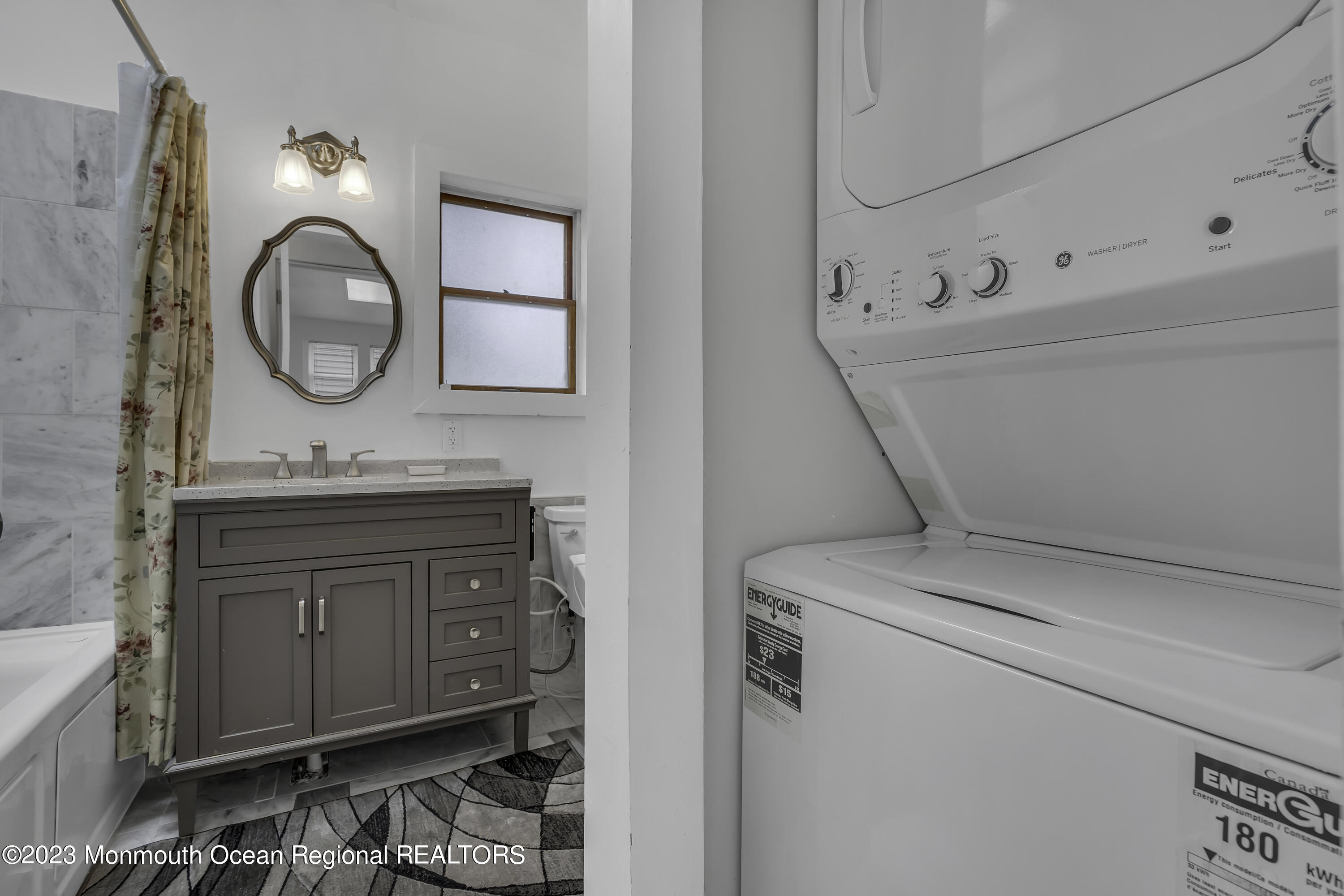 237 Broadway Union Beach, NJ 07735 - Photo 14 of 23 a bathroom with a sink and a mirror