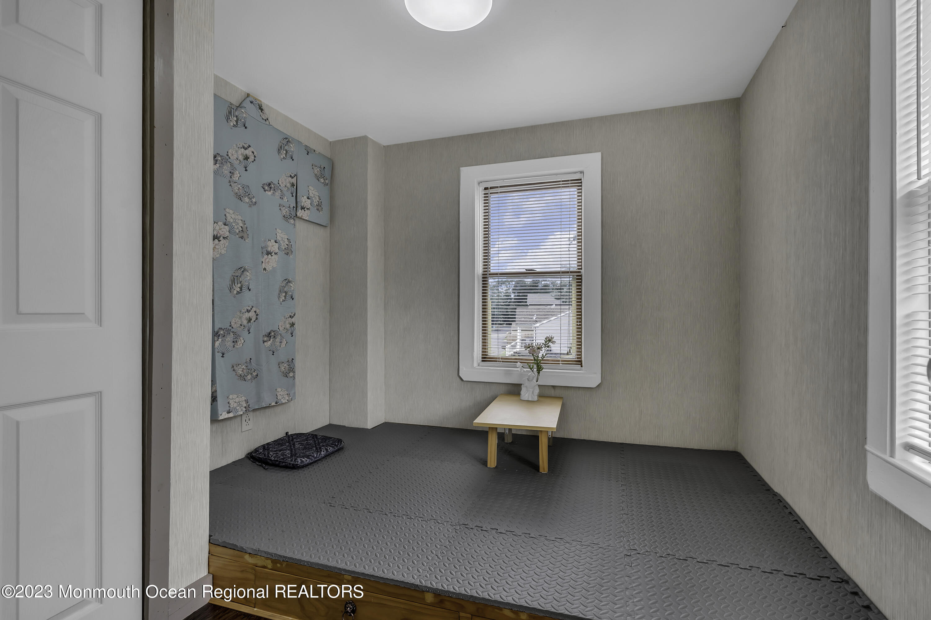 237 Broadway Union Beach, NJ 07735 - Photo 16 of 23 a living room with furniture and a window