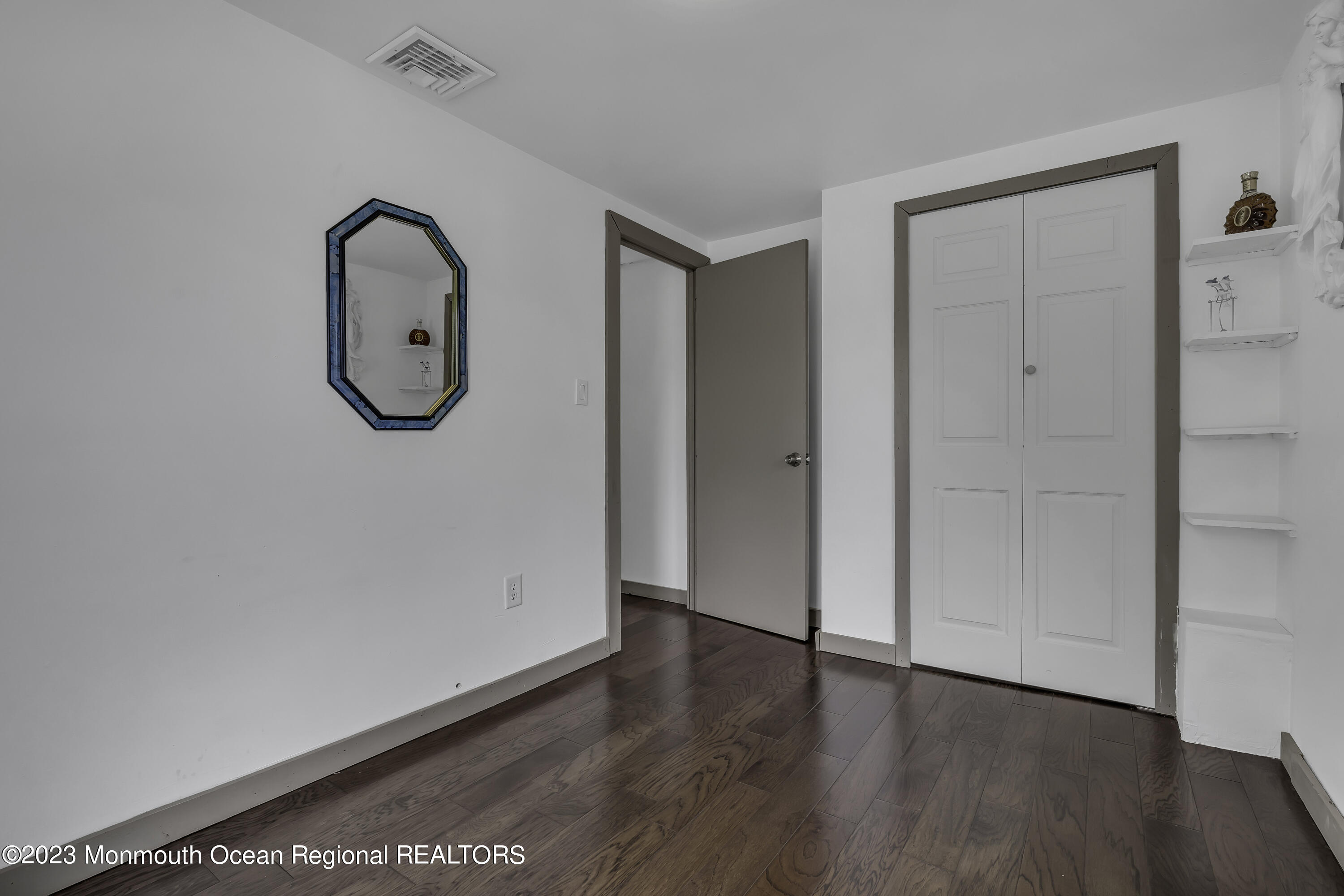 237 Broadway Union Beach, NJ 07735 - Photo 18 of 23 a view of a hallway with wooden floor