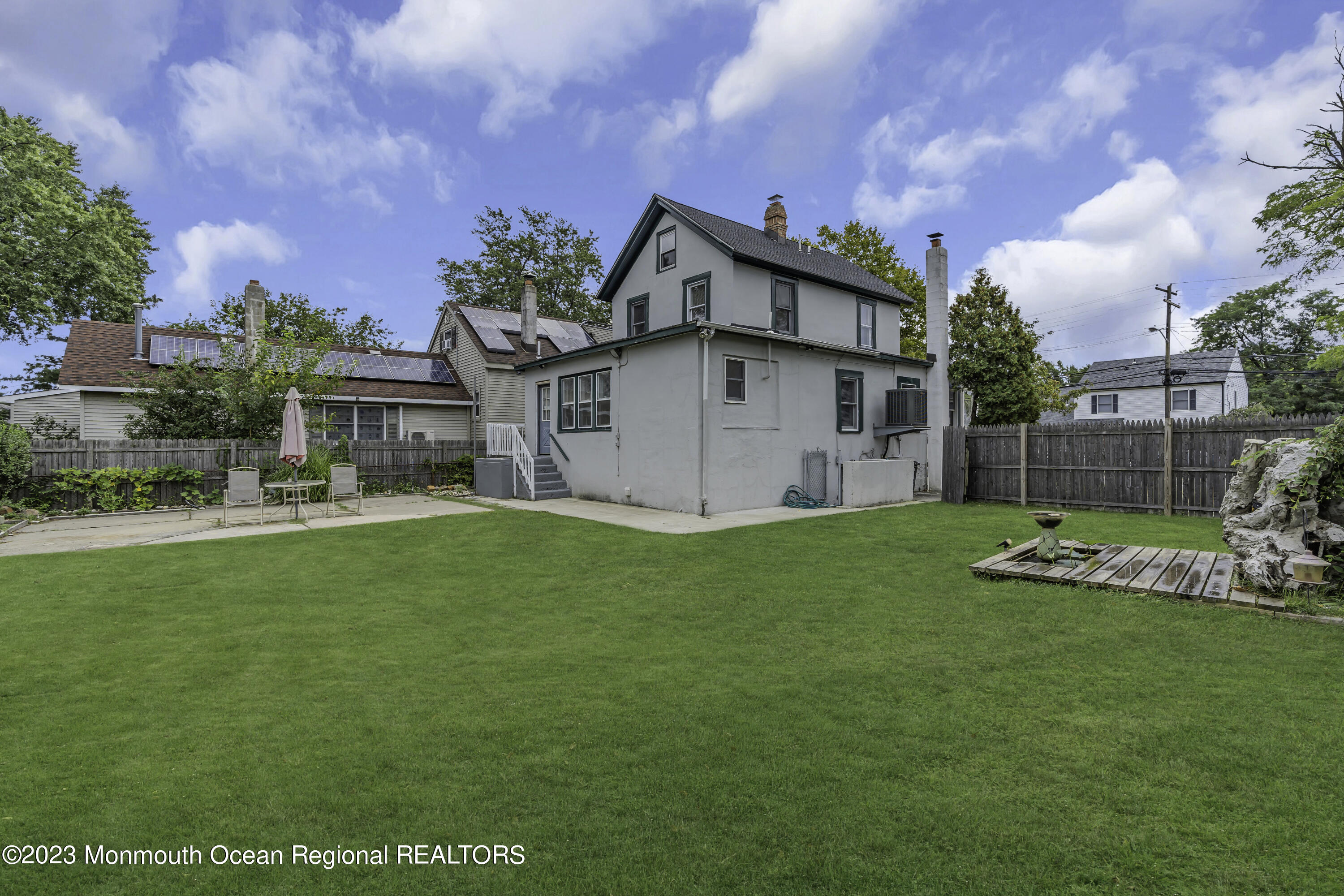 237 Broadway Union Beach, NJ 07735 - Photo 23 of 23 a view of a house with a yard