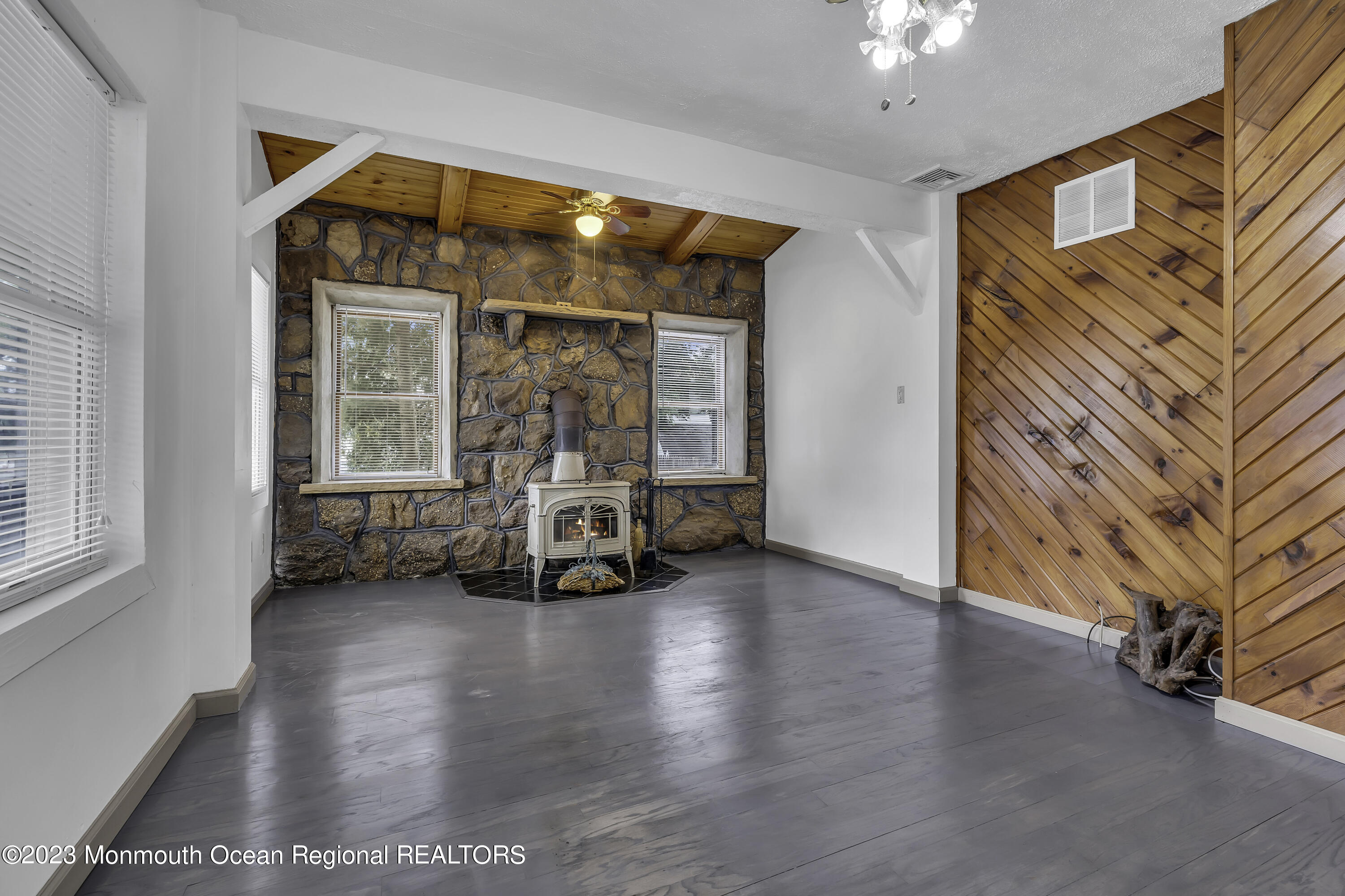 237 Broadway Union Beach, NJ 07735 - Photo 5 of 23 a view of a livingroom with furniture and a ceiling fan