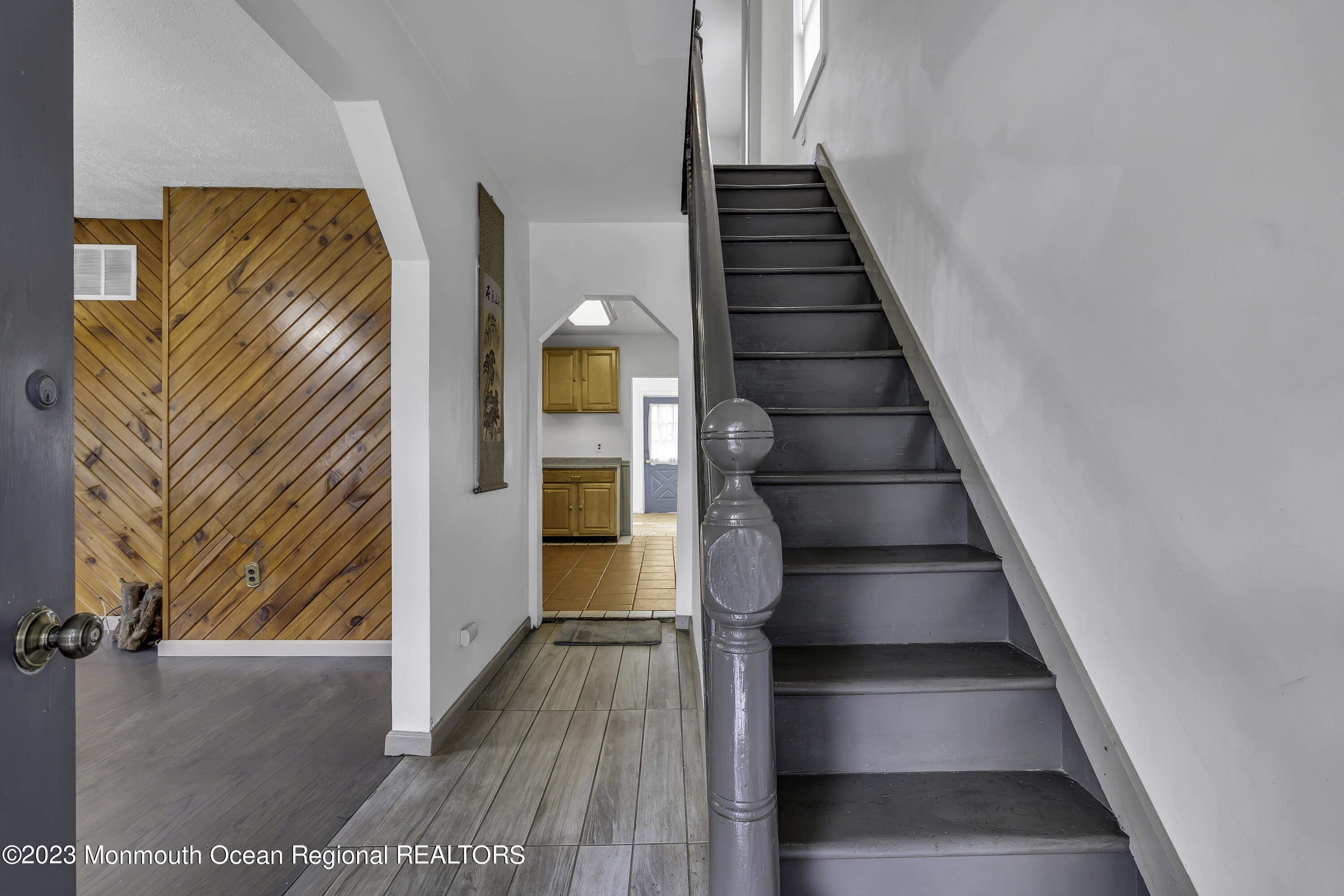237 Broadway Union Beach, NJ 07735 - Photo 7 of 23 a view of entryway and hall with wooden floor
