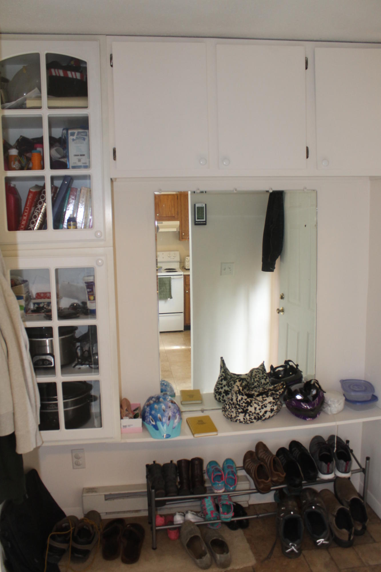 26 Round House Road, Unit 26 Bourne, MA 02532 - Photo 11 of 25 a room with furniture and a book shelf