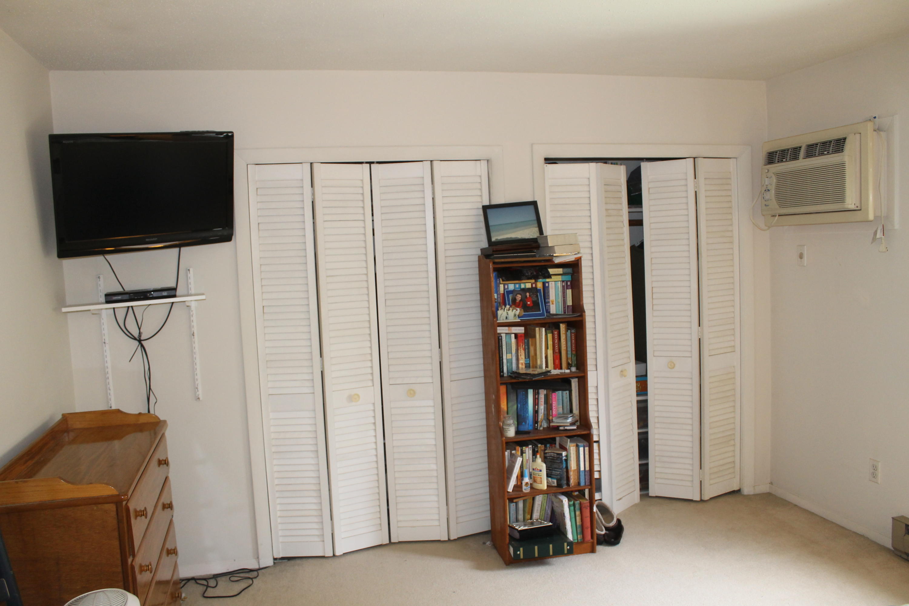 26 Round House Road, Unit 26 Bourne, MA 02532 - Photo 14 of 25 a view of a livingroom with furniture and a flat screen tv