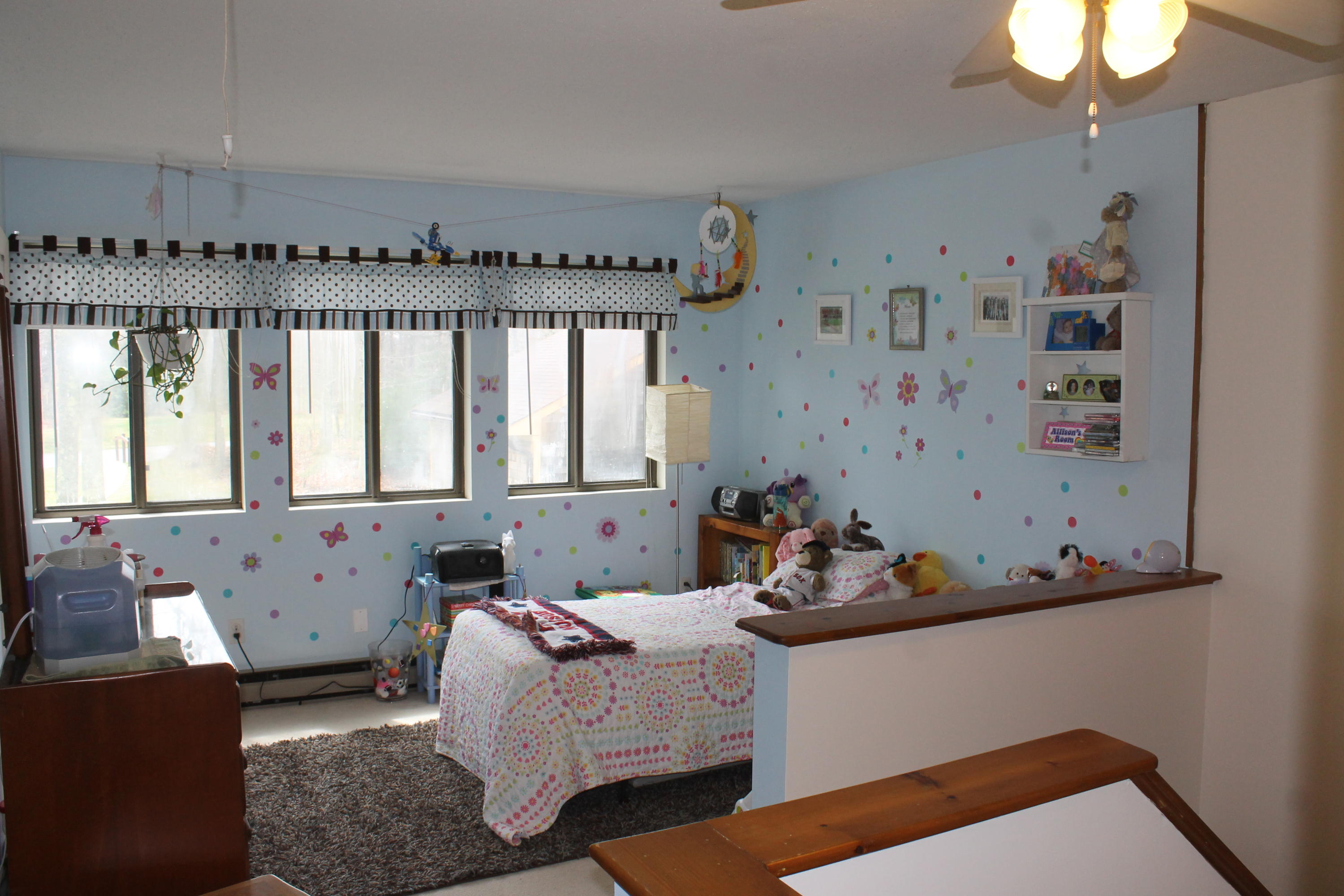 26 Round House Road, Unit 26 Bourne, MA 02532 - Photo 15 of 25 a living room with furniture and a window