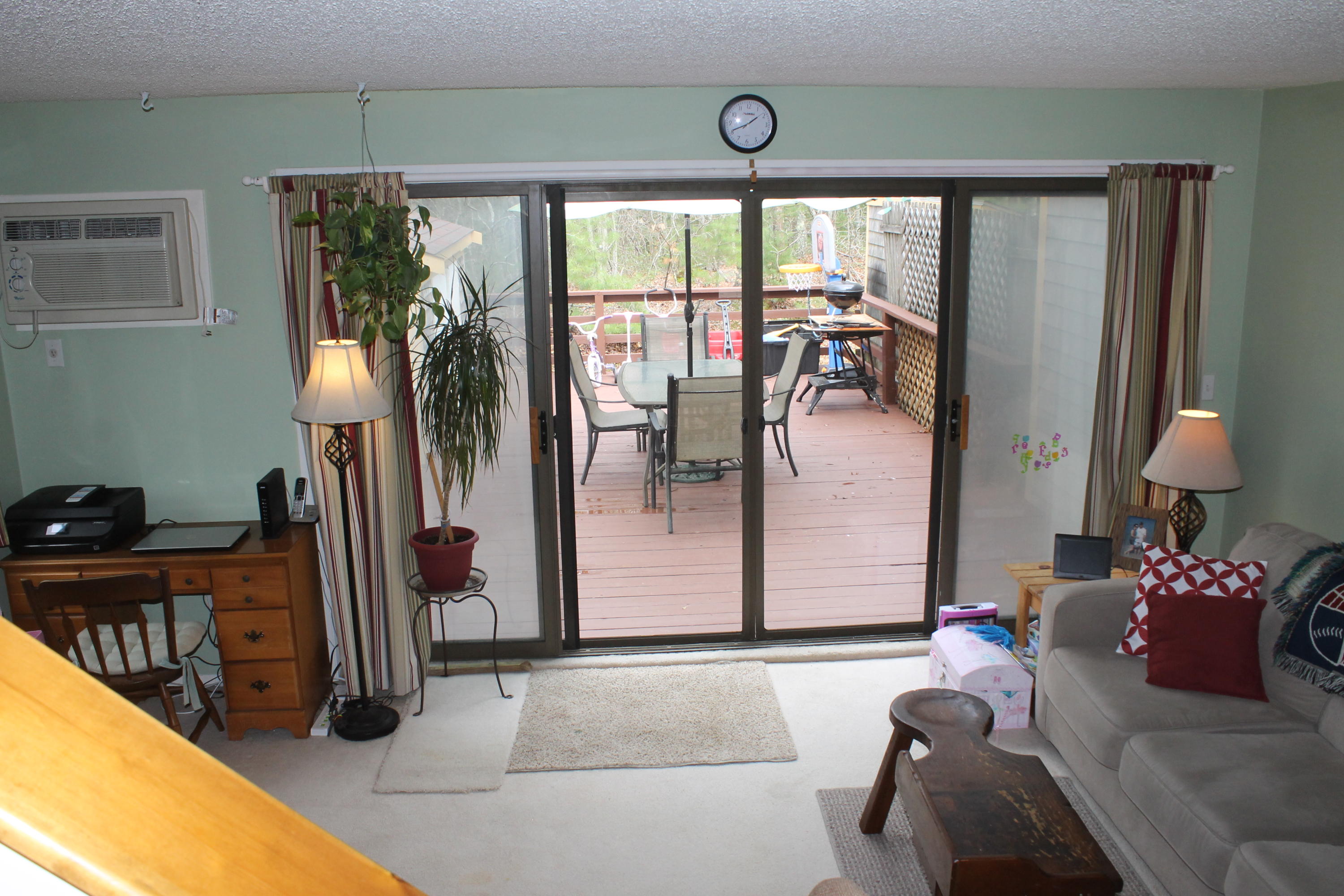 26 Round House Road, Unit 26 Bourne, MA 02532 - Photo 4 of 25 a living room with furniture and a large window