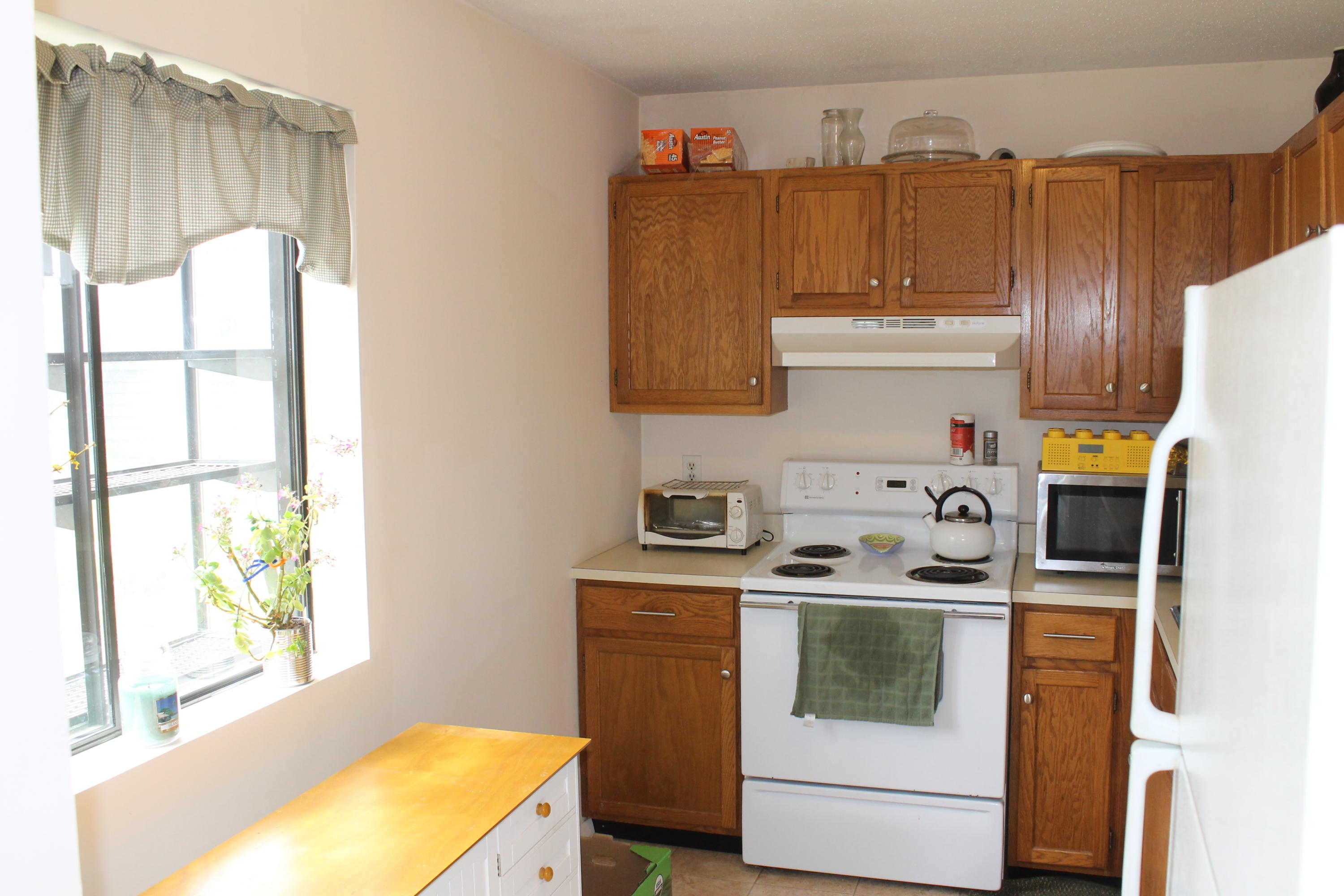 26 Round House Road, Unit 26 Bourne, MA 02532 - Photo 9 of 25 a utility room with fridge dryer and washer