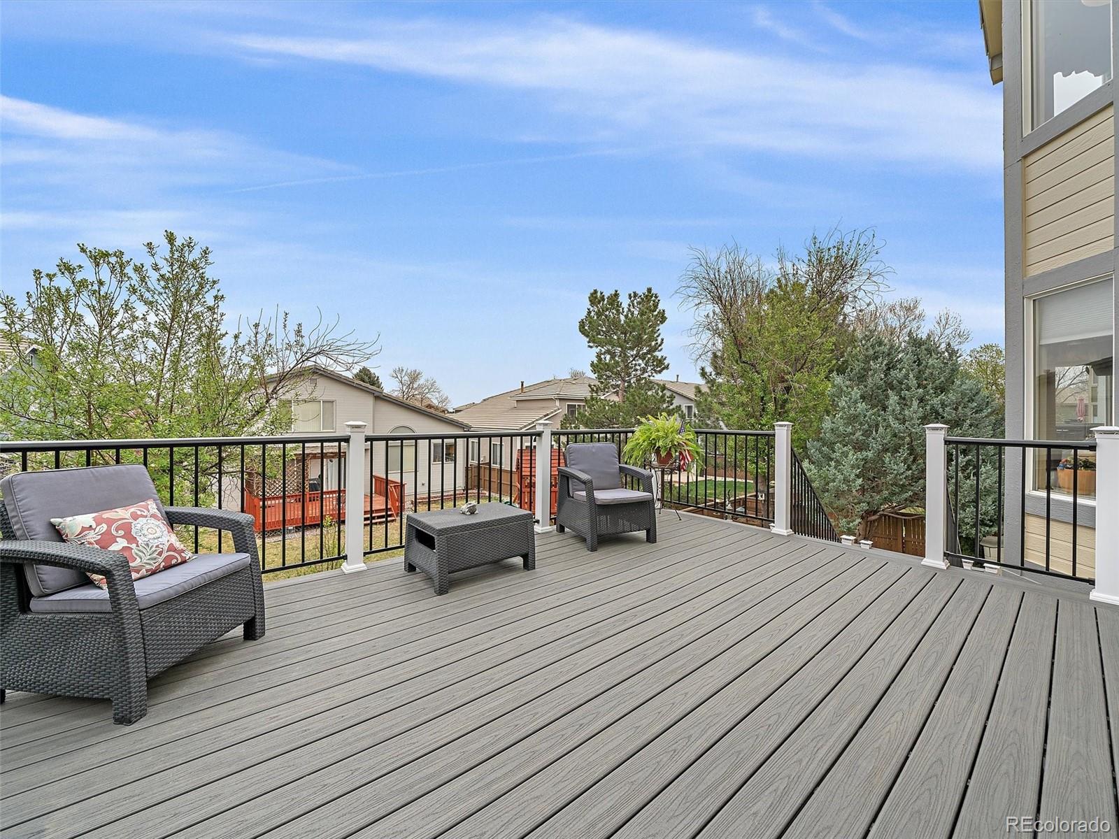 6523 Shannon Trail Highlands Ranch, CO 80130 - Photo 14 of 38 a view of a roof deck with couches
