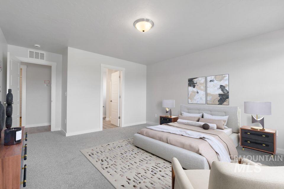 1340 Dawn Street Weiser, ID 83672 - Photo 14 of 32 Carpeted bedroom with baseboards and ensuite bath