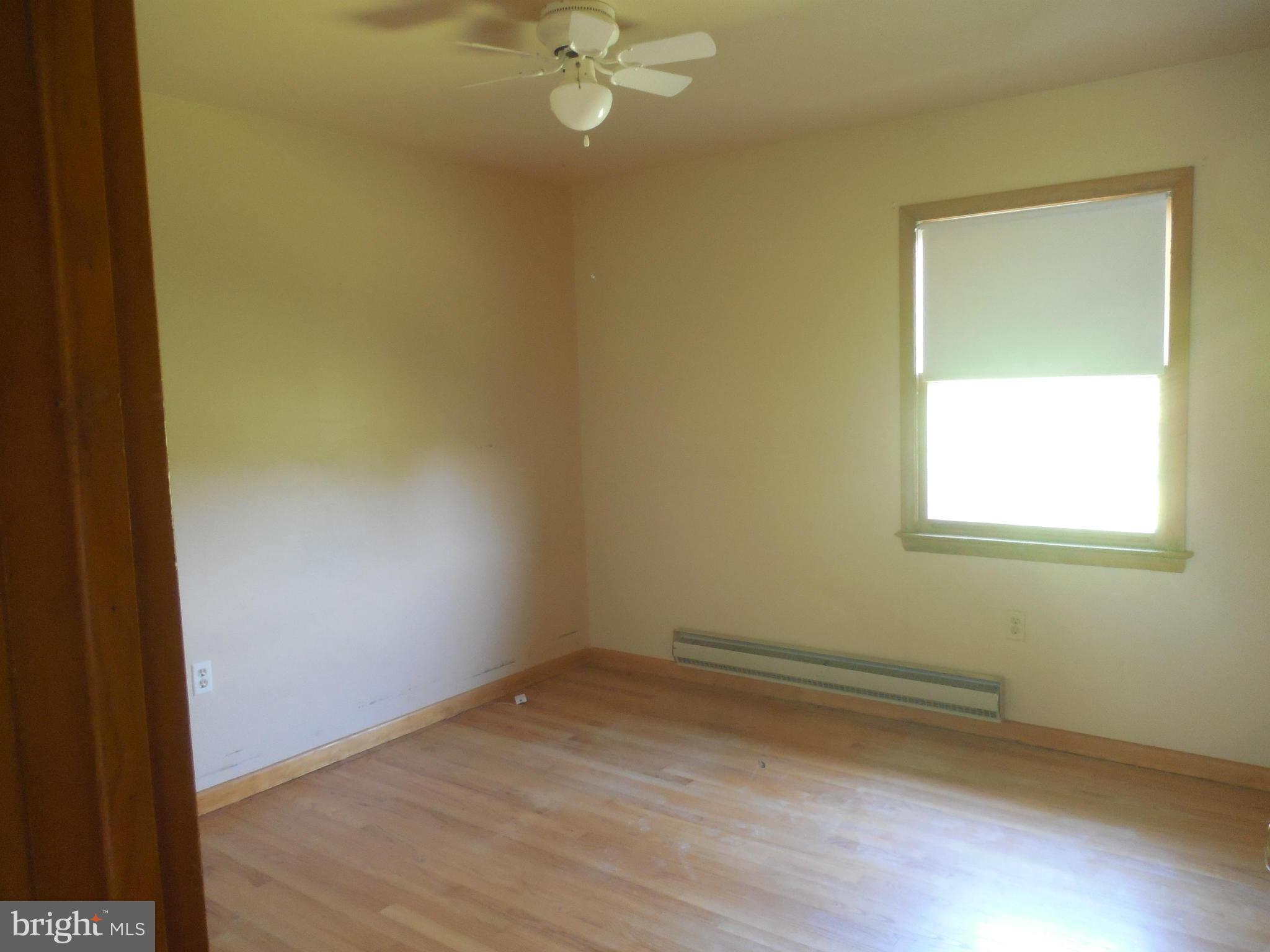 15057 New Windsor Road New Windsor, MD 21776 - Photo 11 of 30 Third bedroom has window a/c and hardwood floors