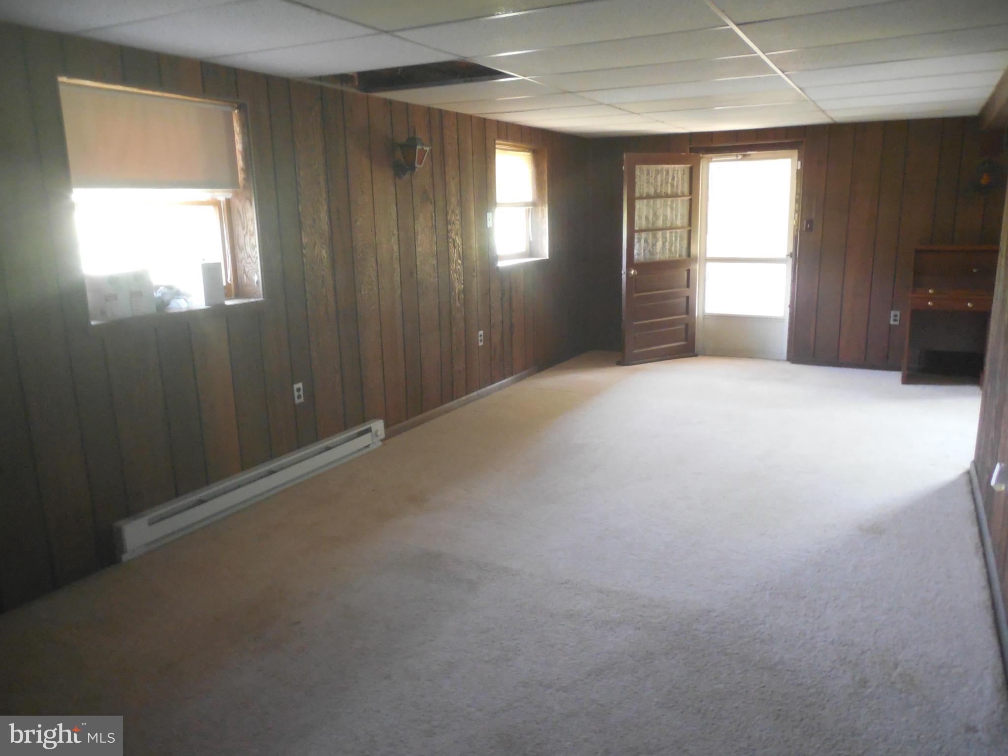 15057 New Windsor Road New Windsor, MD 21776 - Photo 14 of 30 Family room has carpet and an outside door