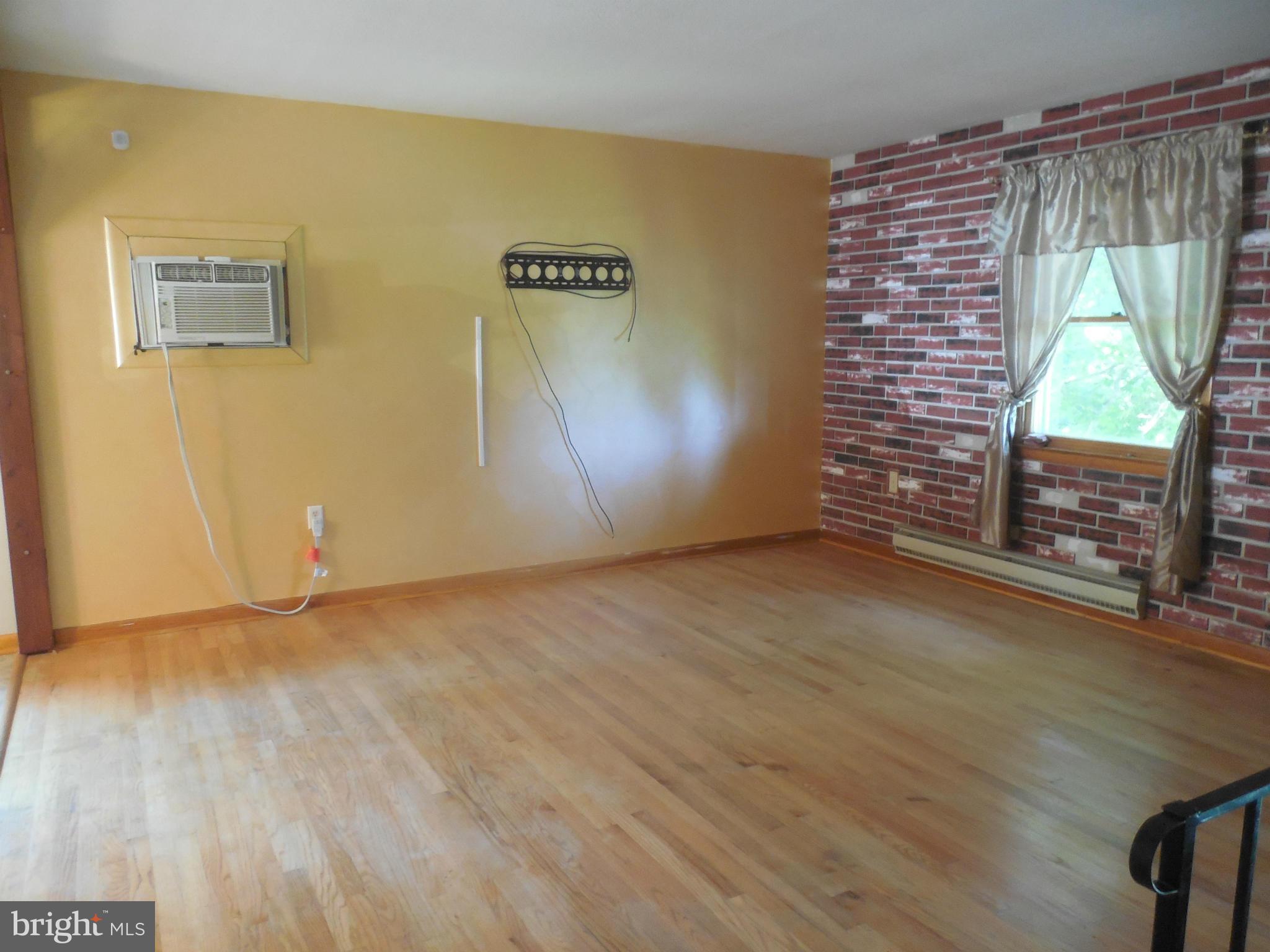 15057 New Windsor Road New Windsor, MD 21776 - Photo 4 of 30 Living Room has hardwood floors