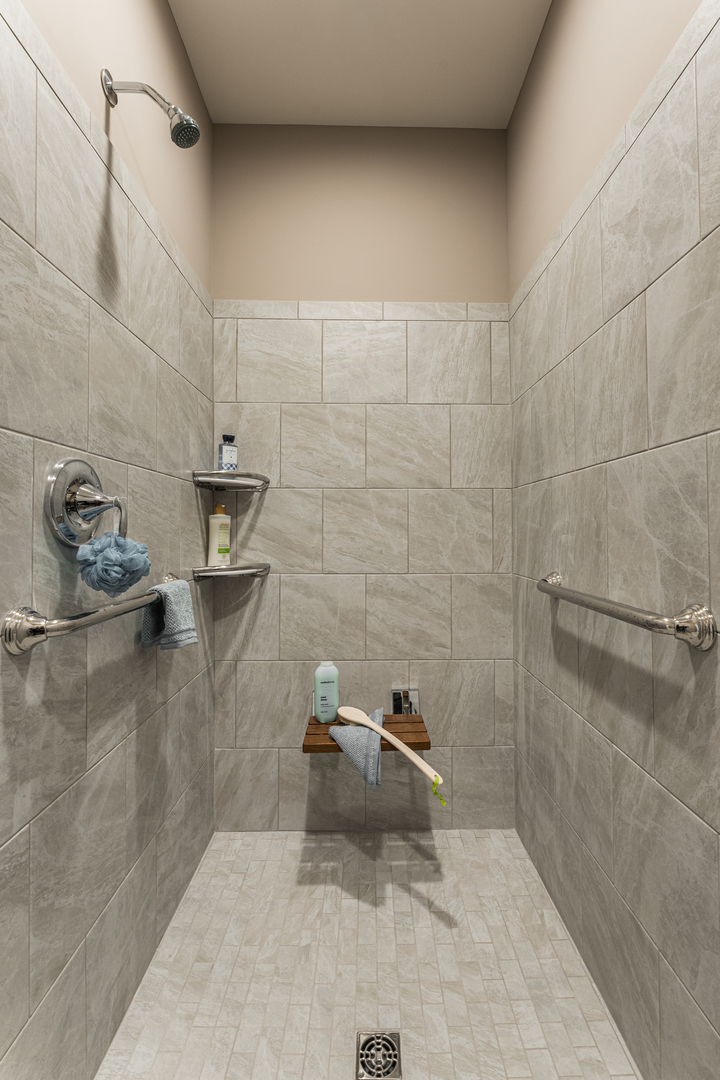 108 Boulder Court, Unit 108 Genoa, IL 60135 - Photo 12 of 25 a bathroom with a shower