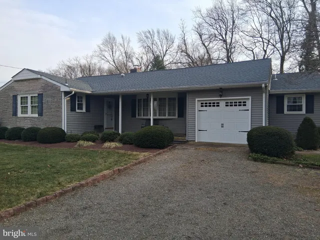 a house view with a backyard space