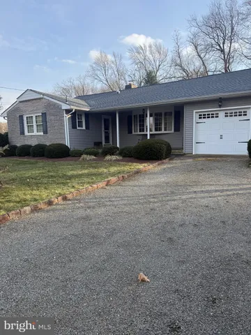 a view of a yard in front of a house