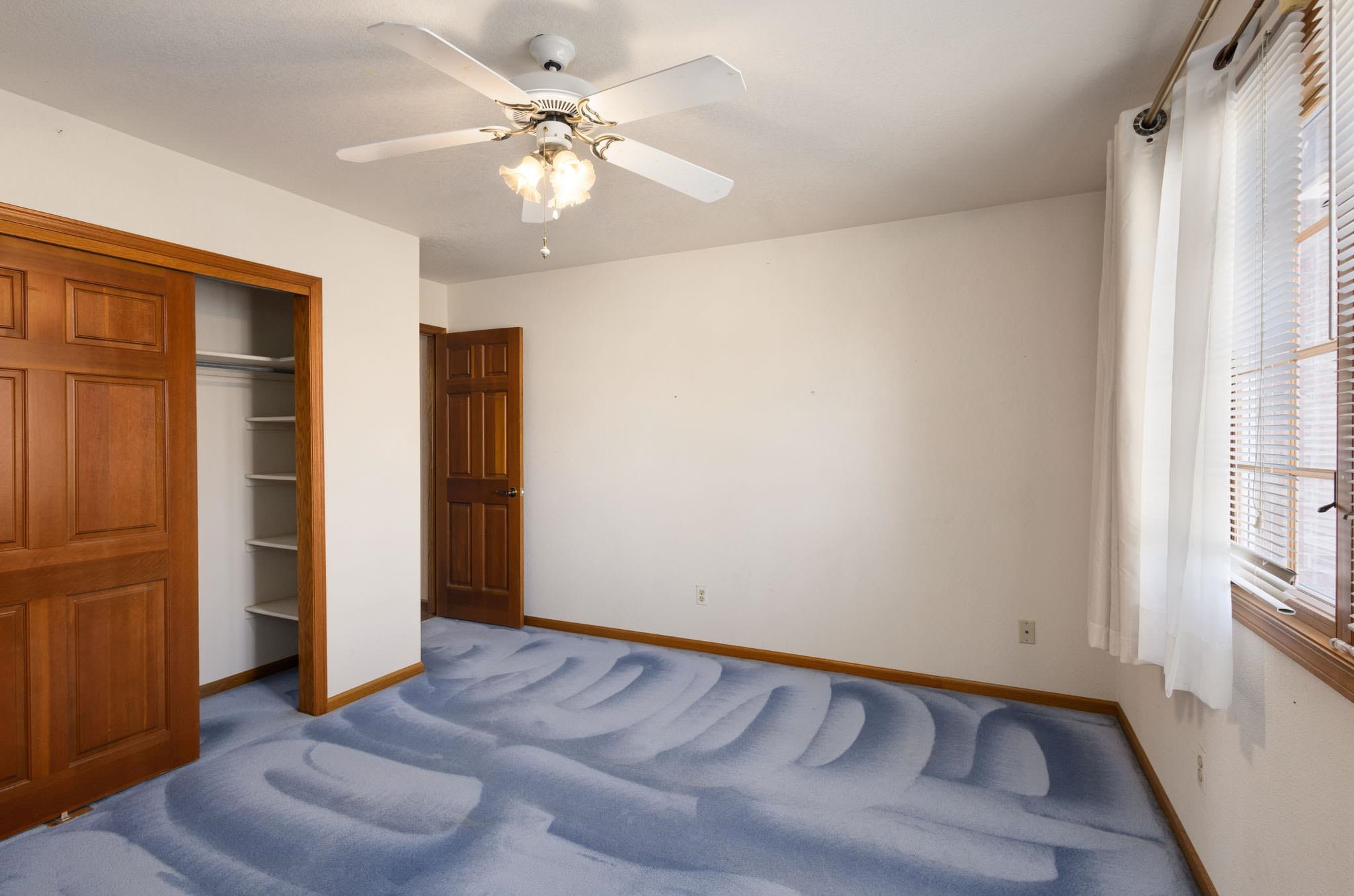 1331 Ruby Way Longmont, CO 80504 - Photo 15 of 42 wooden floor in an empty room with a window