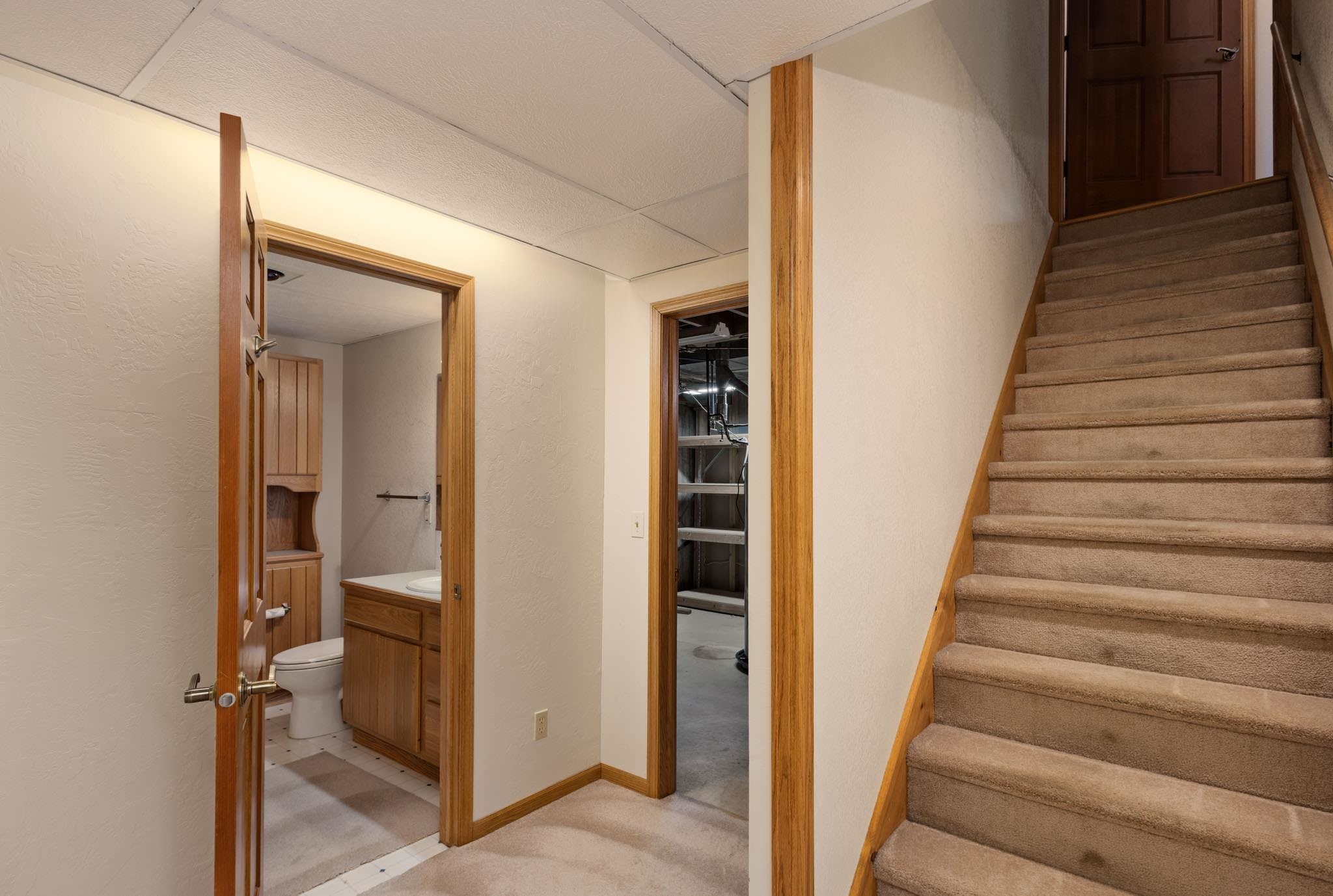 1331 Ruby Way Longmont, CO 80504 - Photo 22 of 42 a view of a hallway with wooden floor and entryway