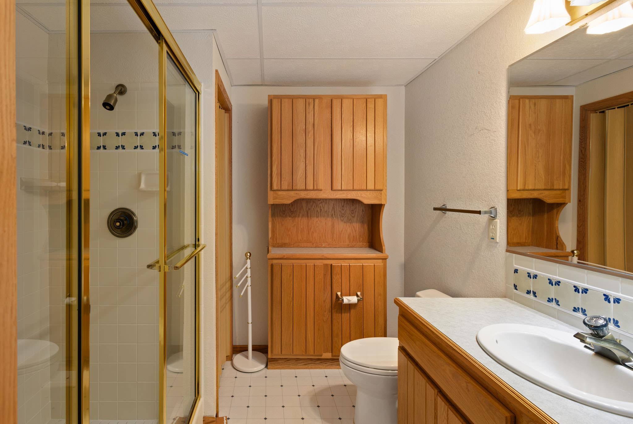 1331 Ruby Way Longmont, CO 80504 - Photo 23 of 42 a bathroom with a sink toilet and shower