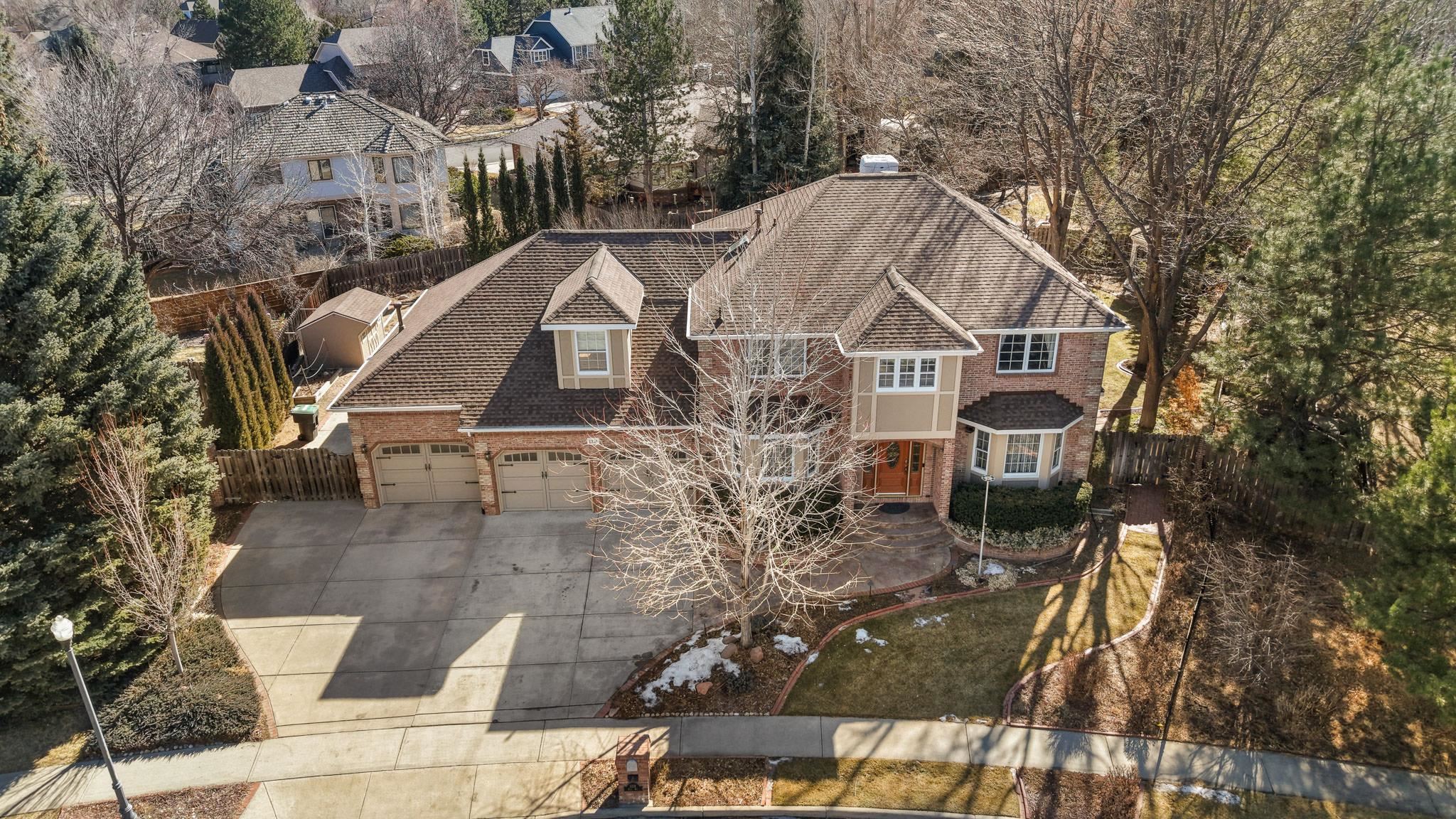 1331 Ruby Way Longmont, CO 80504 - Photo 41 of 42 a view of a house with a yard