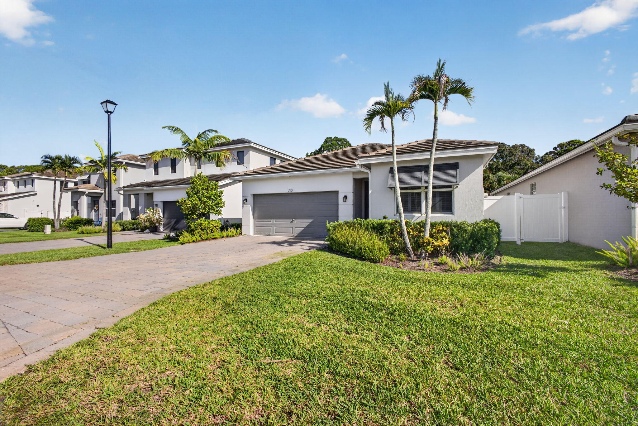 7151 Rockwood Road Jupiter, FL 33458 - Photo 2 of 74 1-web-or-mls-5D1A3188