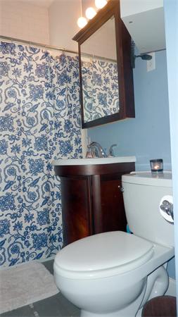 14 Linden Street, Unit 2 Brookline, MA 02445 - Photo 13 of 16 a bathroom with a toilet and a sink