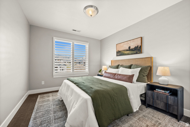14728 South Canyon Pointe Road Draper, UT 84020 - Photo 24 of 35 Light gray walls complement the window with white plantation shutters, offering natural illumination