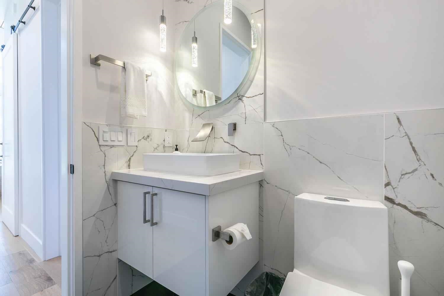 11614 Henness Road Truckee, CA 96161 - Photo 13 of 21 a bathroom with a sink a toilet and shower